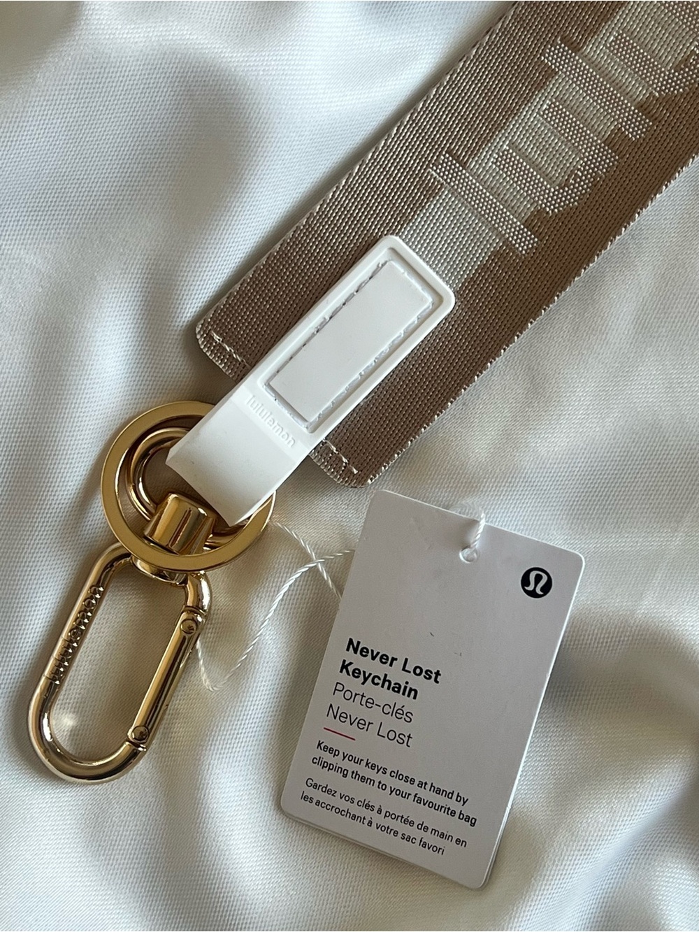 LULULEMON ATHLETIC CREAM AND GOLD HARDWARE NEVER LOSE YOUR KEYS KEYCHAIN - Picture 4 of 5